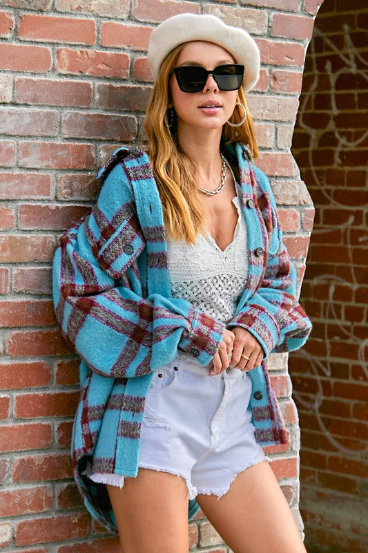 Vallis JacketA striking and versatile check-patterned jacket that effortlessly combines style and comfort. This jacket features a captivating check pattern and is designed with a