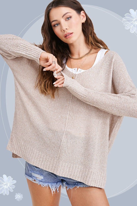 Winnie SweaterUnbelievably soft, lightweight easy to wear sweater featured in relaxed fit, stretchy fabric, high low hemline, side slit detail. Wear this relaxed fit sweater as ma