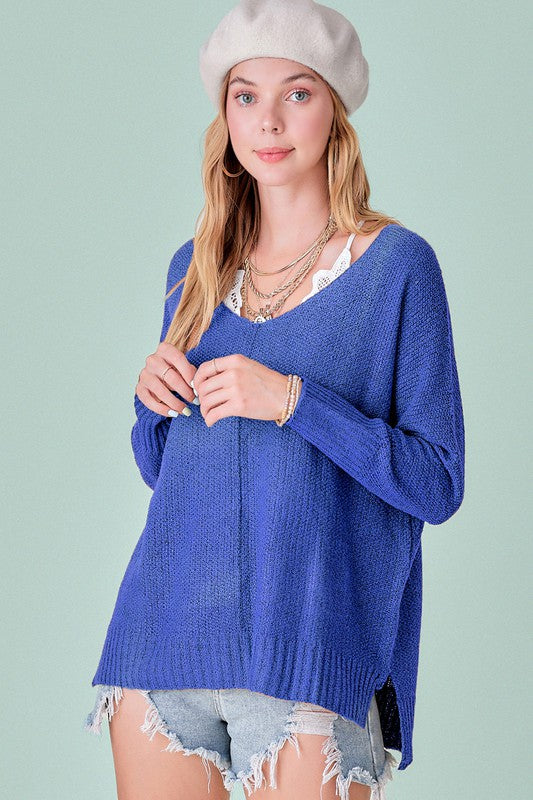 Winnie SweaterUnbelievably soft, lightweight easy to wear sweater featured in relaxed fit, stretchy fabric, high low hemline, side slit detail. Wear this relaxed fit sweater as ma