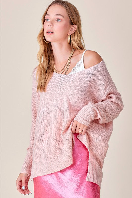 Winnie SweaterUnbelievably soft, lightweight easy to wear sweater featured in relaxed fit, stretchy fabric, high low hemline, side slit detail. Wear this relaxed fit sweater as ma