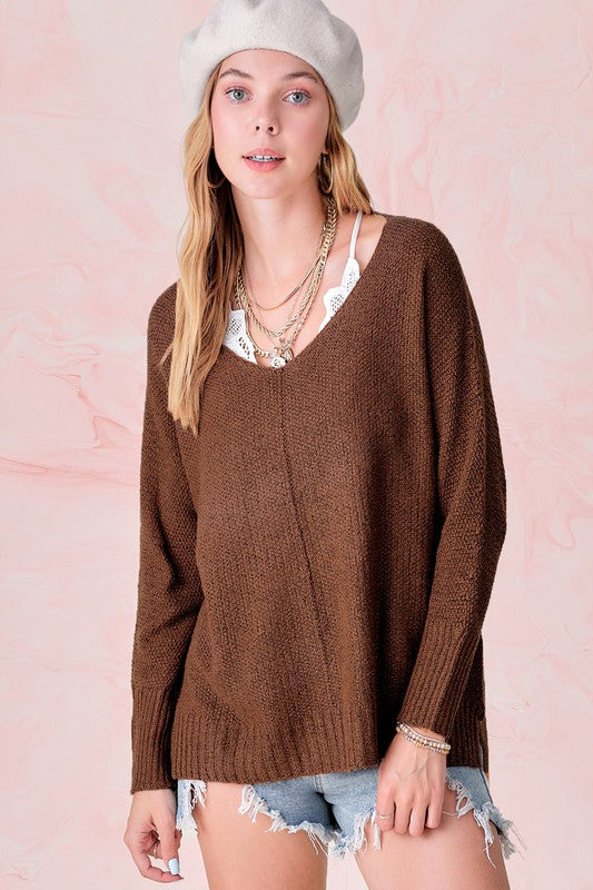 Winnie SweaterUnbelievably soft, lightweight easy to wear sweater featured in relaxed fit, stretchy fabric, high low hemline, side slit detail. Wear this relaxed fit sweater as ma