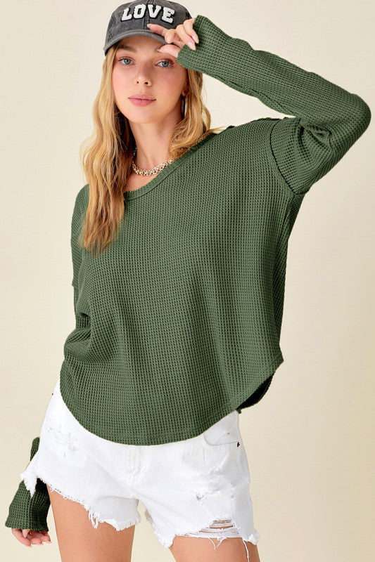 Joanne TopThick waffle-knit top with raw edge and stitch detail.C-3* Size info: True to size* Product Measurement - SIZE - SMALL - LENGTH: 24 1/2" - SLEEVE LENGTH: S: 22" M: 2