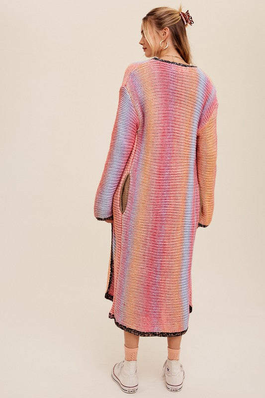 Multi Color Gradation Long Knit Open CardiganThis cardigan redefines versatility with its multi-color gradation design, offering a dynamic and eye-catching look. Crafted with meticulous attention to detail, the