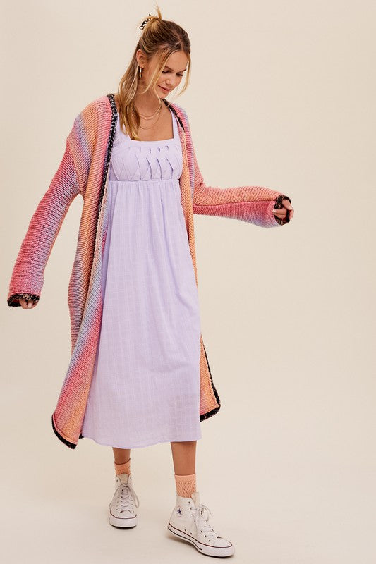 Multi Color Gradation Long Knit Open CardiganThis cardigan redefines versatility with its multi-color gradation design, offering a dynamic and eye-catching look. Crafted with meticulous attention to detail, the