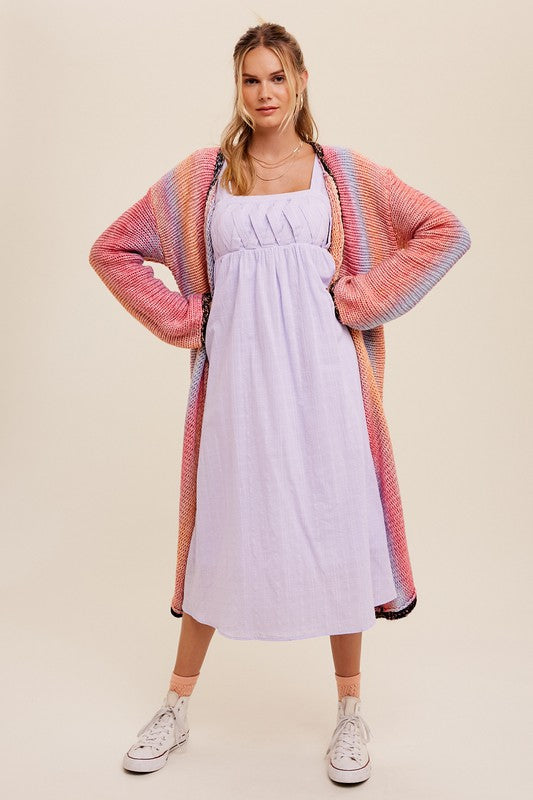 Multi Color Gradation Long Knit Open CardiganThis cardigan redefines versatility with its multi-color gradation design, offering a dynamic and eye-catching look. Crafted with meticulous attention to detail, the