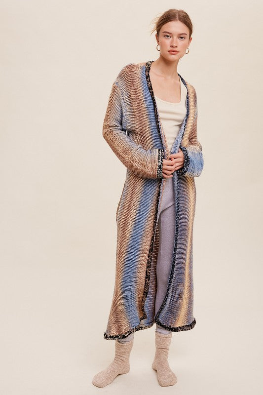 Multi Color Gradation Long Knit Open CardiganThis cardigan redefines versatility with its multi-color gradation design, offering a dynamic and eye-catching look. Crafted with meticulous attention to detail, the