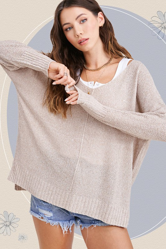 Winnie SweaterUnbelievably soft, lightweight easy to wear sweater featured in relaxed fit, stretchy fabric, high low hemline, side slit detail. Wear this relaxed fit sweater as ma