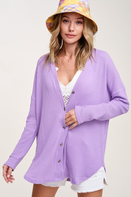 Greta CardiganWrap yourself in comfort and style with this casual cardigan made from soft and stretchy waffle fabric. It's perfect for layering or wearing on its own, making it a 