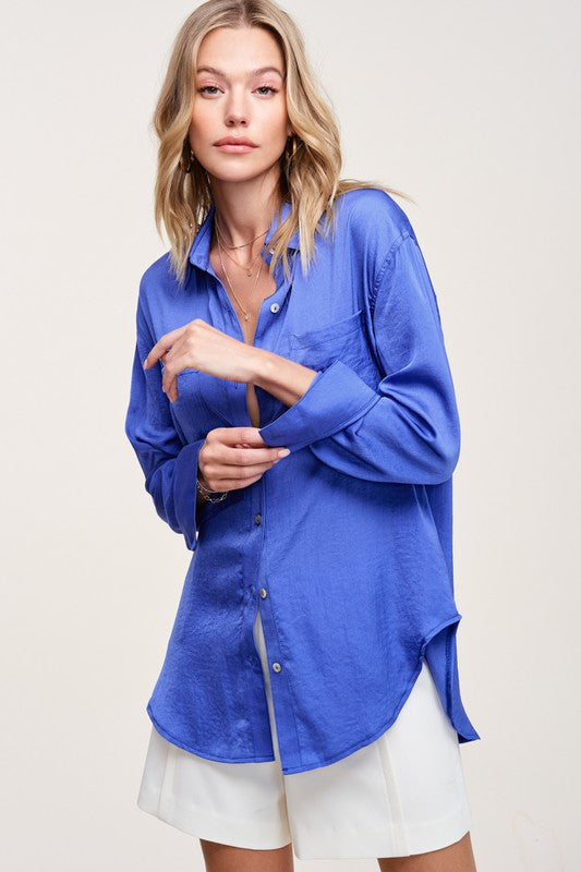 Hazel TopA stunning and versatile button-down shirt that exudes elegance and sophistication with its silky appearance. This top features a captivating silky texture and is ad