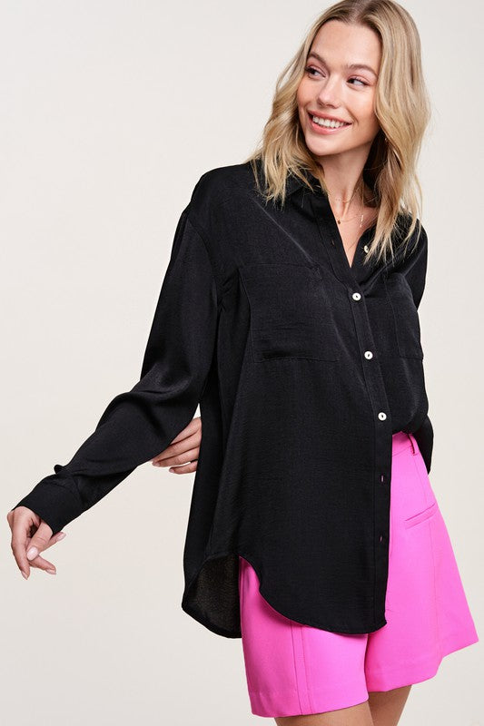 Hazel TopA stunning and versatile button-down shirt that exudes elegance and sophistication with its silky appearance. This top features a captivating silky texture and is ad