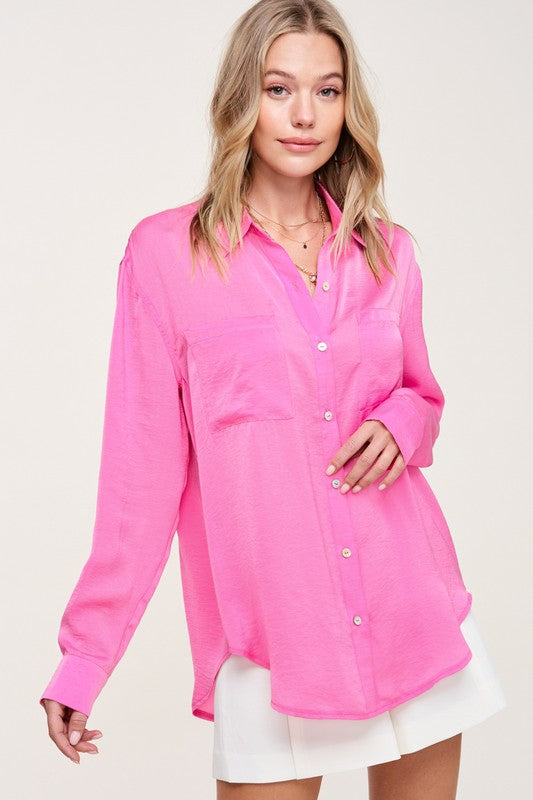 Hazel TopA stunning and versatile button-down shirt that exudes elegance and sophistication with its silky appearance. This top features a captivating silky texture and is ad