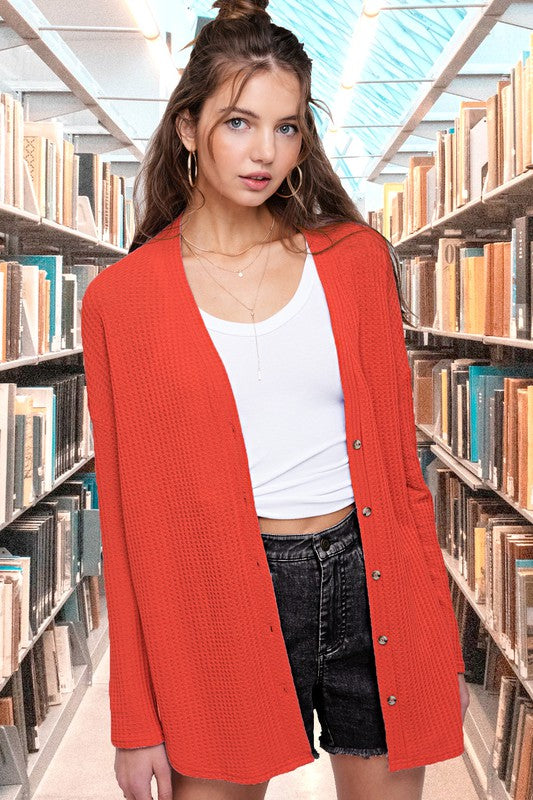 Greta CardiganWrap yourself in comfort and style with this casual cardigan made from soft and stretchy waffle fabric. It's perfect for layering or wearing on its own, making it a 