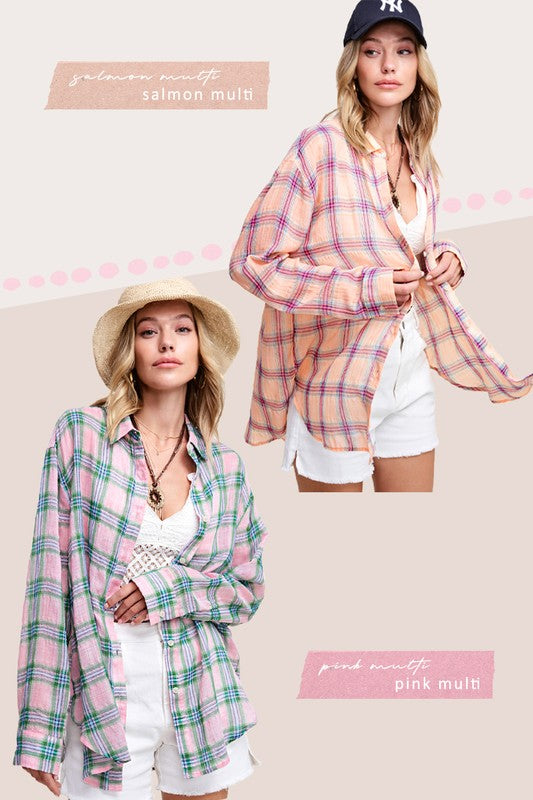 Liz ShirtA bold and stylish button-down shirt that effortlessly blends fashion and comfort. This shirt features a striking plaid print and is designed with a relaxed fit, mak