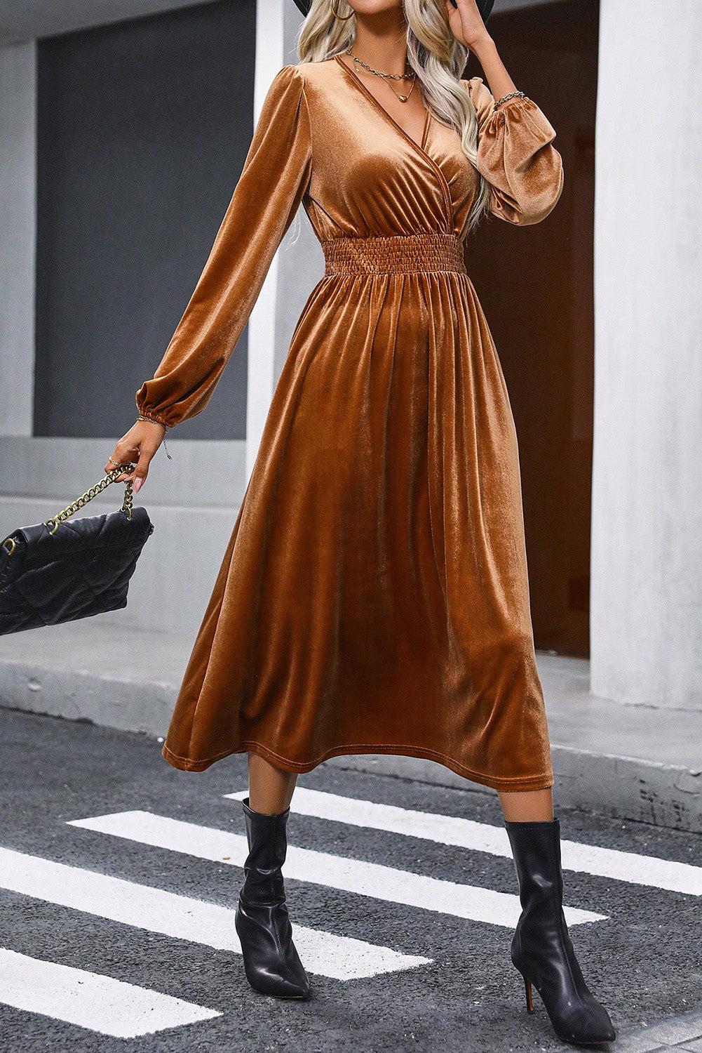 Camel Wrap V Neck Smocked High Waist Velvet Midi DressMaterial:95%POLYESTER+5%ELASTANE



		The midi dress is an elegant and luxurious dress that exudes sophistication. It features a wrap-style bodice with a V-necklin