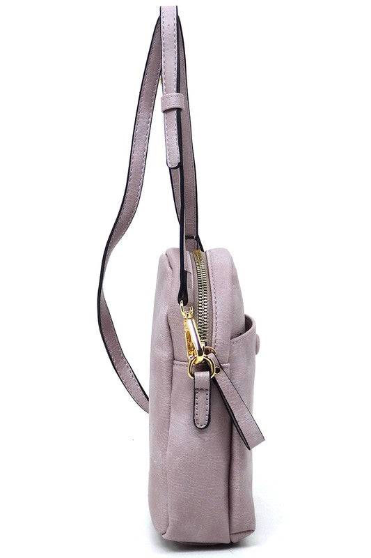 Front Pocket Mini Crossbody Bag Cell Phone PurseFront Pocket Mini Crossbody Bag Cell Phone Purse Faux vegan leather Zip top closure Gold-tone hardware Detachable shoulder strap L 5.5 * H 7.5 * W 2.5