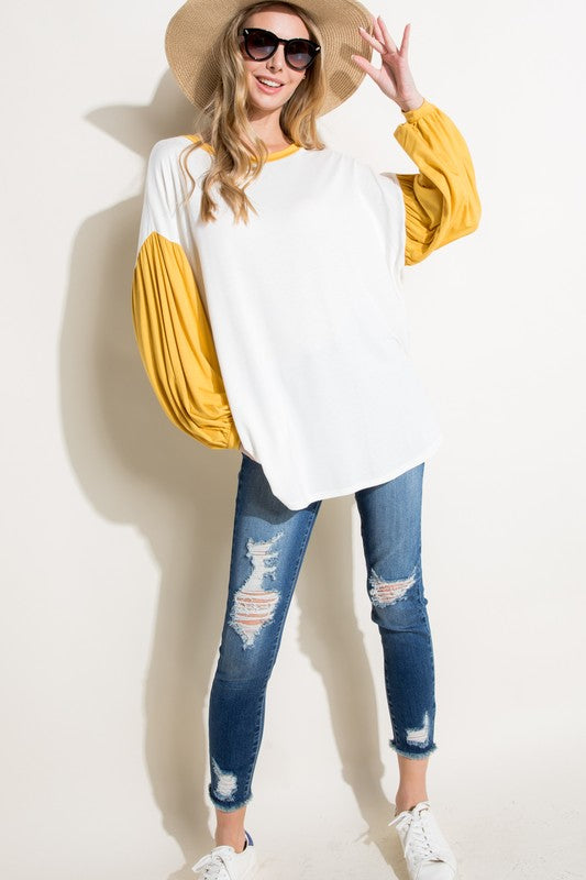 COLOR BLOCK VOLUME PUFF SLEEVE TOPSOLID JERSEY COLOR BLOCK VOLUMED PUFF LONG SLEEVE ROUND NECK TOP95% RAYON, 5% SPANDEX MADE IN USAS/M/L 2-2-2
Style: Casual
Print / Pattern: SOLID
Fit: Loose
Neck Lin