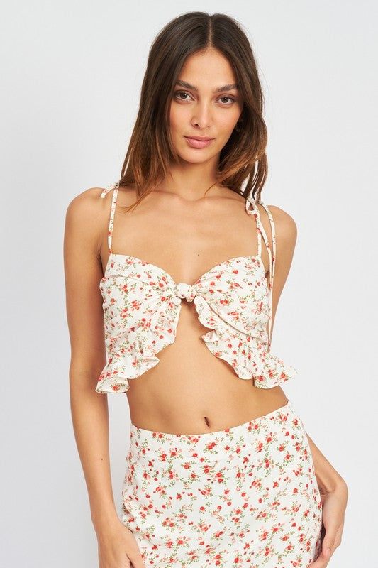 FRONT KNOT CROP TOP WITH RUFFLE DETAILSIZE &amp; FIT :MODEL WEARS SIZE SMALLMODEL'S HEIGHT 5'9Made In: IMPORTEDFabric Contents: 100% POLYESTERLINING: 100% POLYESTER