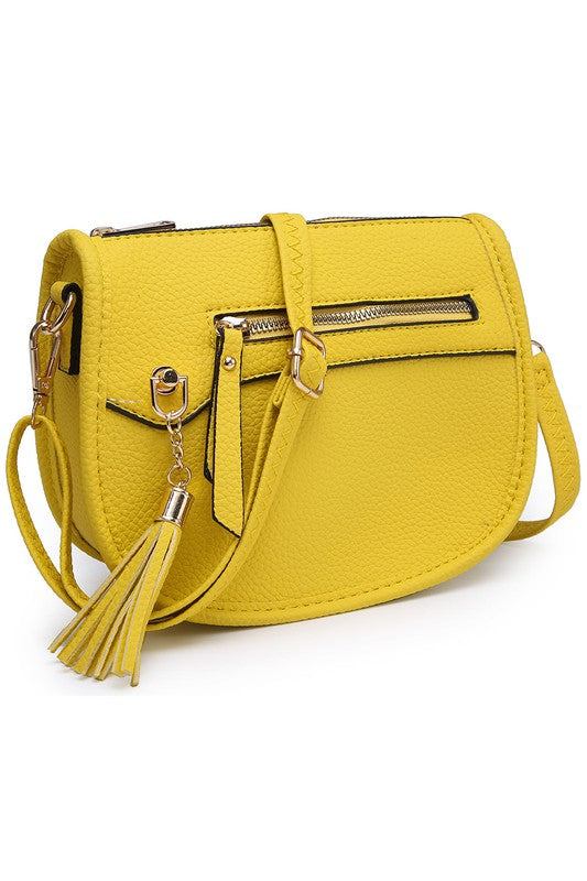 Fashion Saddle Crossbody BagFashion Saddle Crossbody Bag Faux vegan leather Zip top closure Gold-tone hardware Adjustable shoulder strap L 8 * H 6.5 * W 3