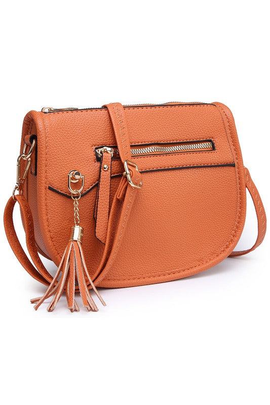 Fashion Saddle Crossbody BagFashion Saddle Crossbody Bag Faux vegan leather Zip top closure Gold-tone hardware Adjustable shoulder strap L 8 * H 6.5 * W 3