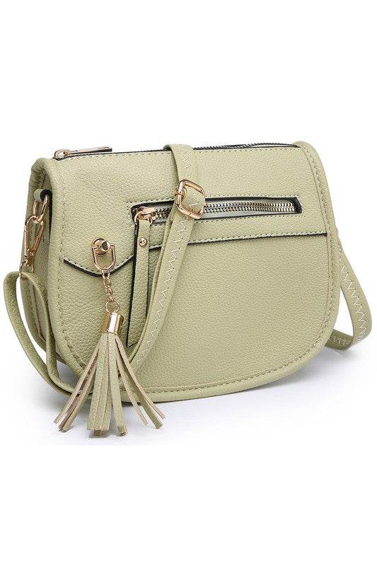 Fashion Saddle Crossbody BagFashion Saddle Crossbody Bag Faux vegan leather Zip top closure Gold-tone hardware Adjustable shoulder strap L 8 * H 6.5 * W 3