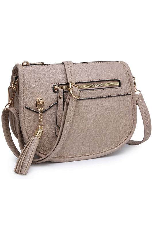 Fashion Saddle Crossbody BagFashion Saddle Crossbody Bag Faux vegan leather Zip top closure Gold-tone hardware Adjustable shoulder strap L 8 * H 6.5 * W 3