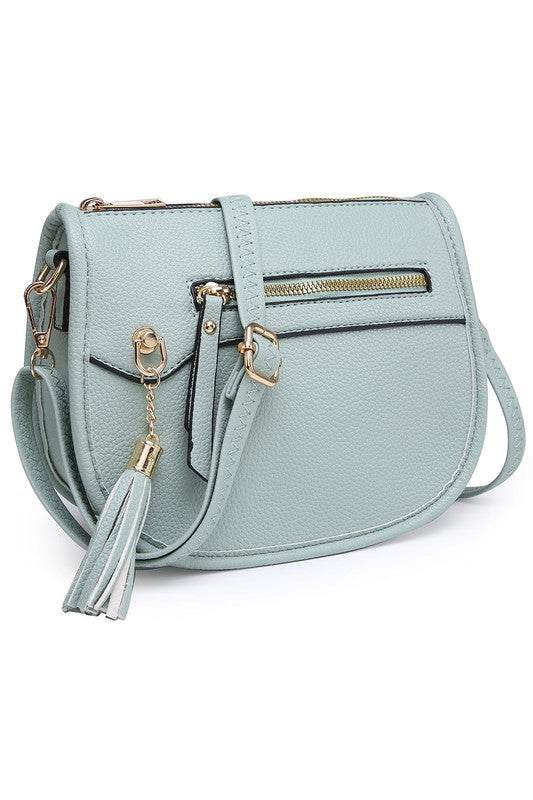 Fashion Saddle Crossbody BagFashion Saddle Crossbody Bag Faux vegan leather Zip top closure Gold-tone hardware Adjustable shoulder strap L 8 * H 6.5 * W 3