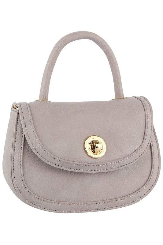 Fashion Twist Lock Flap Saddle SatchelFashion Twist Lock Flap Saddle Satchel Faux vegan leather Turn-lock closure Gold-tone hardware Detachable shoulder strap L 8.5 * H 6.5 * W 2.5 (4 D)