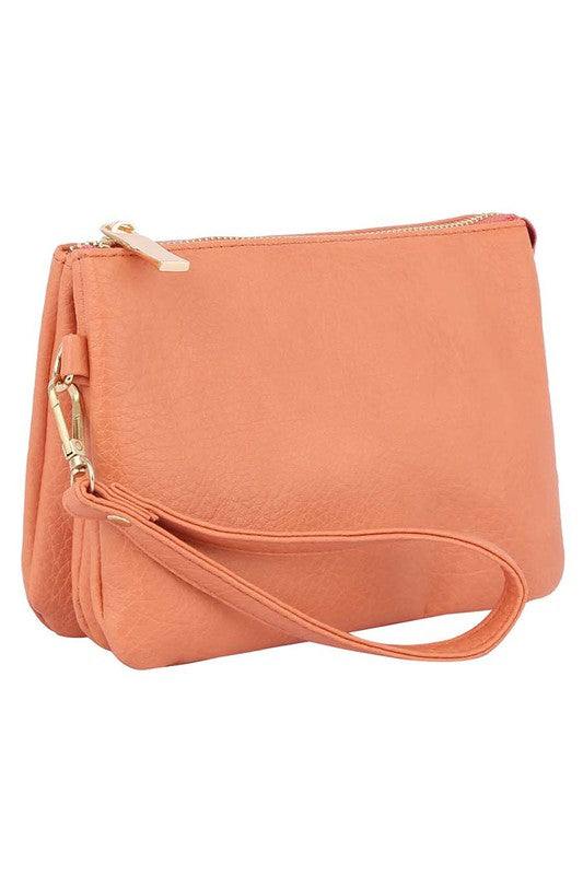 Convertible Clutch Crossbody Bag WristletMulti Compartment Convertible Clutch Crossbody Bag Wristlet Faux vegan leather Zip top closure Gold-tone hardware Detachable shoulder strap &amp; wrist band L 8 * H 