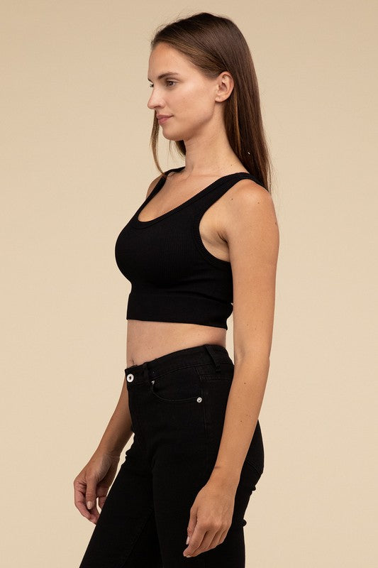 Ribbed Seamless Crop TopElevate your summer essentials with our Ribbed Seamless Crop Top, a versatile piece perfect for layering or wearing solo. Crafted with comfort in mind, it boasts a f