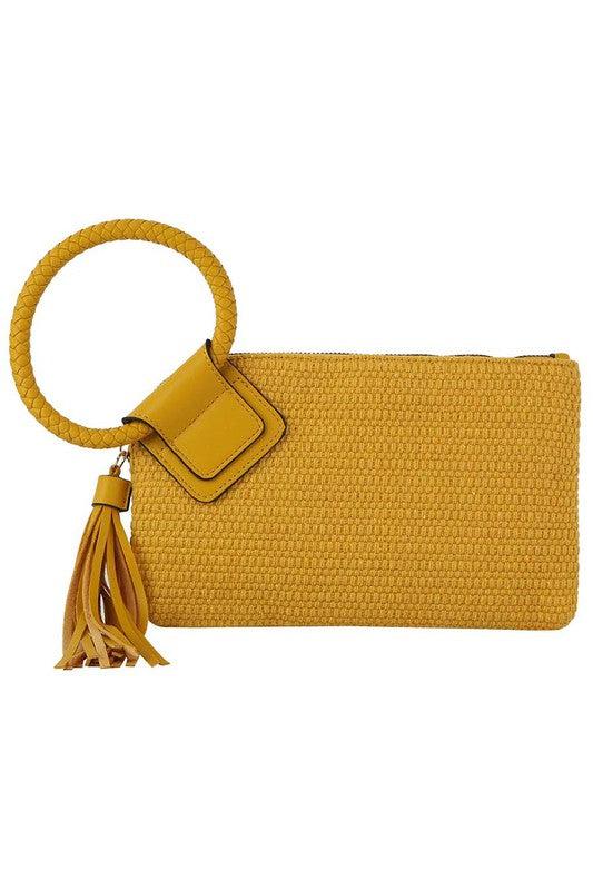 Canvas Cuff Handle Tassel Wristlet ClutchCanvasFaux vegan leather trimZip top closureGold-tone hardwareL 10.5 * H 6.1 * W 1 (4.5 D)