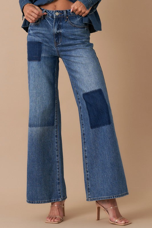 RELAXED WIDE LEG PATCHWORK JEANSRELAXED WIDE LEG PATCHWORK JEANS100% COTTONModel is wearing size 3/25, Height 5'8Waist - 28 1/2Hip - 38Front Rise - 11Leg Opening - 26Inseam - 29SIZE 1-3-5-7-9-11-13