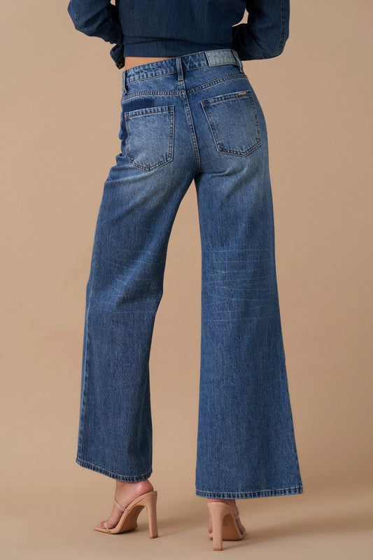 RELAXED WIDE LEG PATCHWORK JEANSRELAXED WIDE LEG PATCHWORK JEANS100% COTTONModel is wearing size 3/25, Height 5'8Waist - 28 1/2Hip - 38Front Rise - 11Leg Opening - 26Inseam - 29SIZE 1-3-5-7-9-11-13