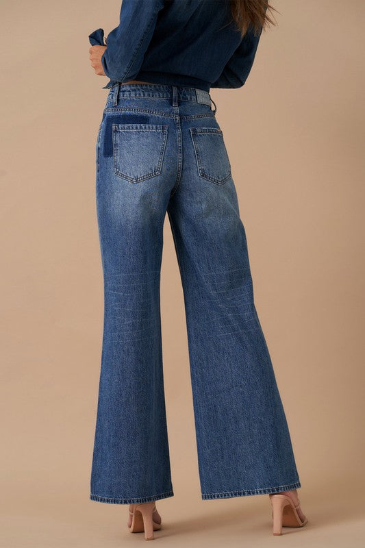 RELAXED WIDE LEG PATCHWORK JEANSRELAXED WIDE LEG PATCHWORK JEANS100% COTTONModel is wearing size 3/25, Height 5'8Waist - 28 1/2Hip - 38Front Rise - 11Leg Opening - 26Inseam - 29SIZE 1-3-5-7-9-11-13