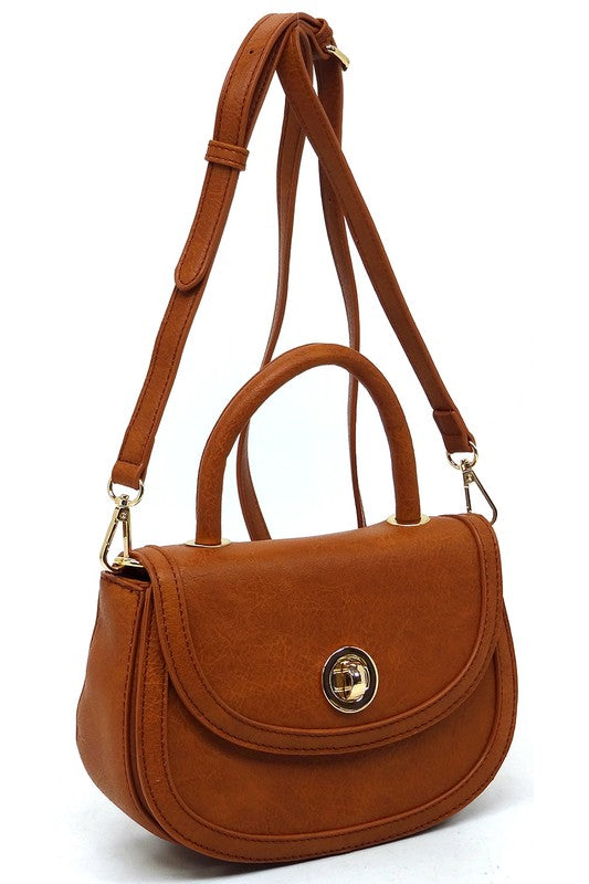 Fashion Flap Saddle SatchelUpgrade your style game with our Fashion Flap Saddle Satchel. This chic accessory features a trendy flap design, adding a touch of sophistication to your ensemble. T