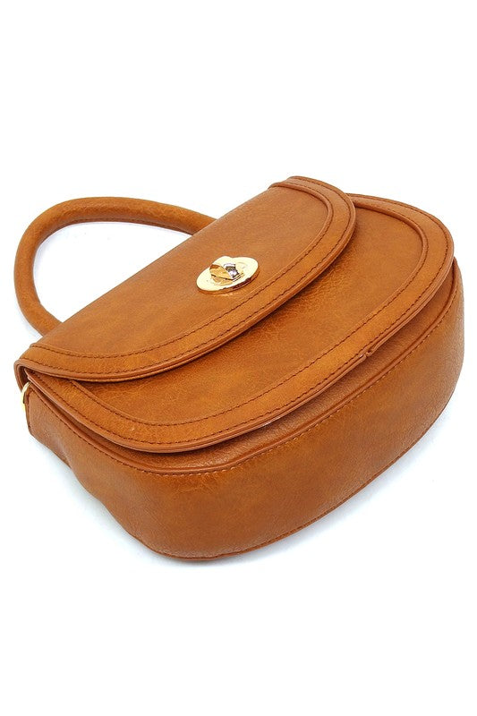 Fashion Flap Saddle SatchelUpgrade your style game with our Fashion Flap Saddle Satchel. This chic accessory features a trendy flap design, adding a touch of sophistication to your ensemble. T