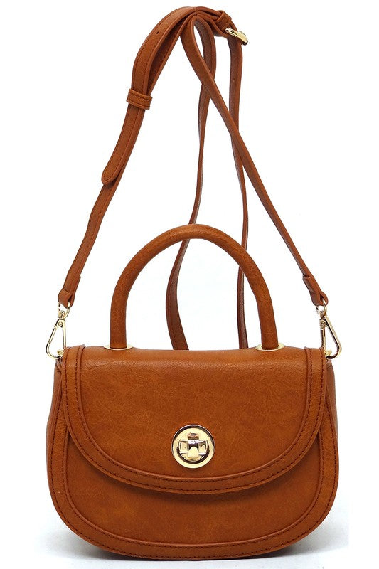 Fashion Flap Saddle SatchelUpgrade your style game with our Fashion Flap Saddle Satchel. This chic accessory features a trendy flap design, adding a touch of sophistication to your ensemble. T