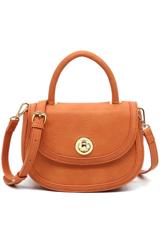 Fashion Flap Saddle SatchelUpgrade your style game with our Fashion Flap Saddle Satchel. This chic accessory features a trendy flap design, adding a touch of sophistication to your ensemble. T