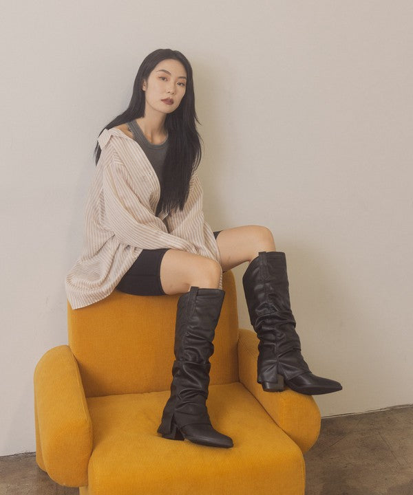 OASIS SOCIETY Thea - Fold Over Slit Jean BootsFold over slit jean boots offer a unique blend of fashion and versatility. These boots feature a distinctive fold-over design and a stylish slit, providing an edgy t