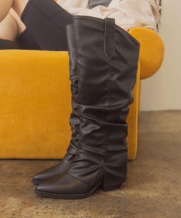 OASIS SOCIETY Thea - Fold Over Slit Jean BootsFold over slit jean boots offer a unique blend of fashion and versatility. These boots feature a distinctive fold-over design and a stylish slit, providing an edgy t