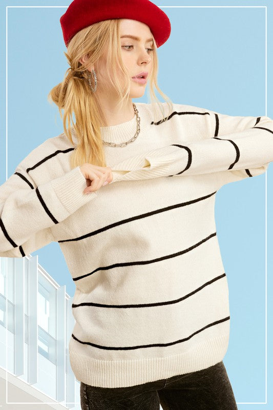 Eunice SweaterIntroducing the Eunice Sweater, a timeless striped pullover that embodies a loose and comfortable fit. This versatile piece is destined to become your go-to option, 