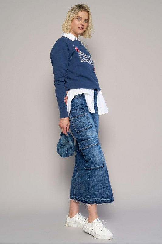 CARGO POCKET LONG SKIRT- 100% Cotton- Non-Stretch Denim- Cargo Pocket Long Skirt- Front Slit Detail- Front Zipper Fly - 8 pocketsThe model is wearing size 3/25, Height 5'8Waist - 28Hip - 3