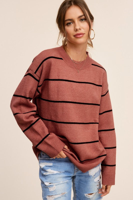 Eunice SweaterIntroducing the Eunice Sweater, a timeless striped pullover that embodies a loose and comfortable fit. This versatile piece is destined to become your go-to option, 