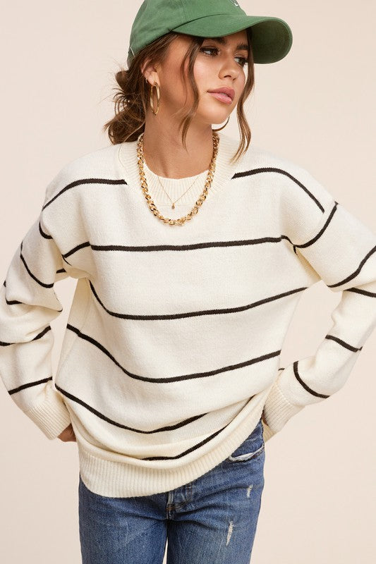 Eunice SweaterIntroducing the Eunice Sweater, a timeless striped pullover that embodies a loose and comfortable fit. This versatile piece is destined to become your go-to option, 