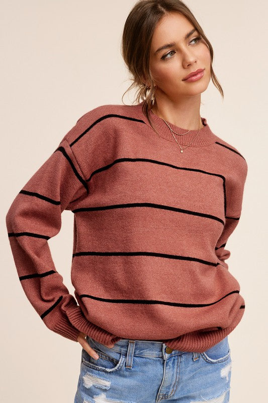 Eunice SweaterIntroducing the Eunice Sweater, a timeless striped pullover that embodies a loose and comfortable fit. This versatile piece is destined to become your go-to option, 