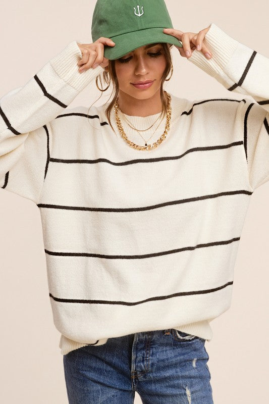 Eunice SweaterIntroducing the Eunice Sweater, a timeless striped pullover that embodies a loose and comfortable fit. This versatile piece is destined to become your go-to option, 