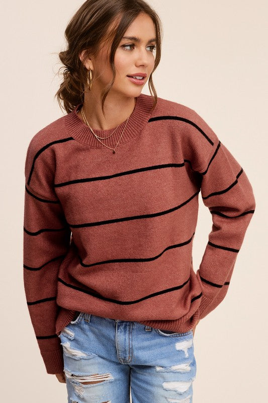 Eunice SweaterIntroducing the Eunice Sweater, a timeless striped pullover that embodies a loose and comfortable fit. This versatile piece is destined to become your go-to option, 