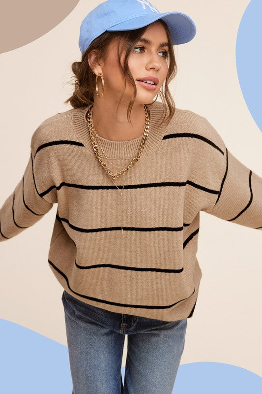 Eunice SweaterIntroducing the Eunice Sweater, a timeless striped pullover that embodies a loose and comfortable fit. This versatile piece is destined to become your go-to option, 