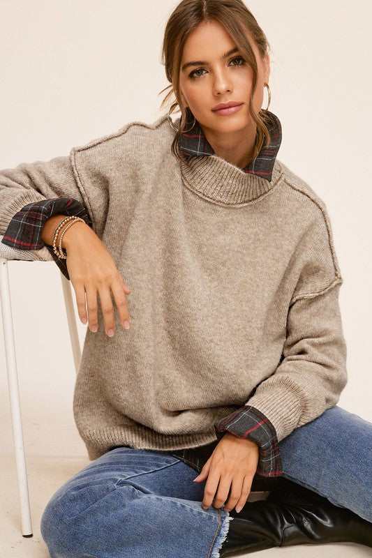 Ella SweaterThe knit sweater embraces both coziness and fashion with its tactile allure and versatile charm. The sweater provides warmth without compromising on style, featuring