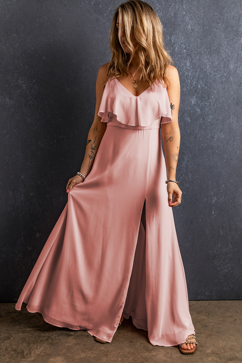 Light Pink Spaghetti Straps V Neck Ruffled Split Long DressMaterial:100%Polyester

• Effortlessly elegant, this dress features a charming ruffled design that cascades down the front.
• The flattering V-neckline and delicat