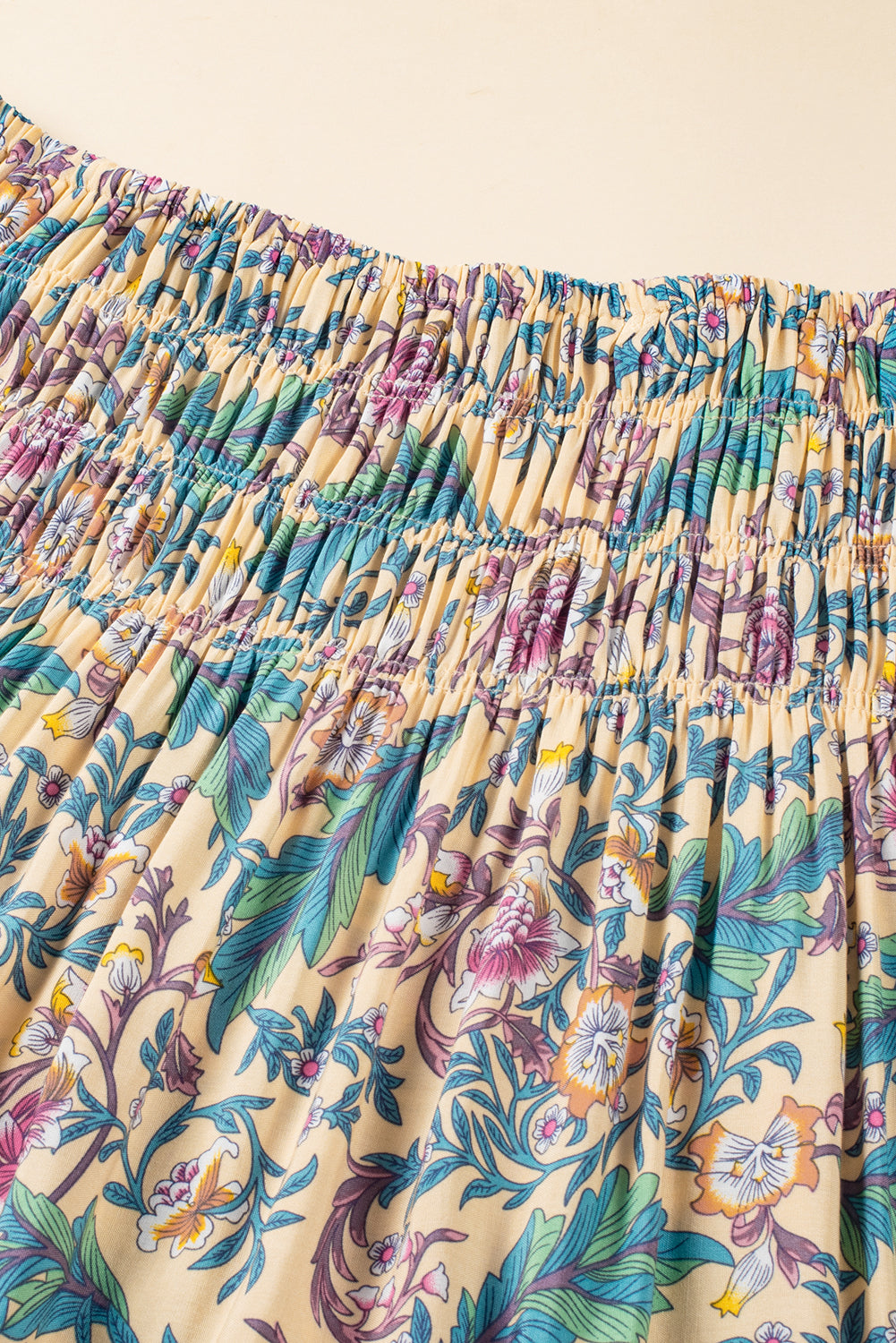 Sky Blue Boho Floral & Paisley Print Shirred Waist Long SkirtMaterial:100%Viscose

• Embrace a bohemian flair with this skirt, featuring a shirred waist that accentuates the natural curves for a flattering fit.
• The intrica